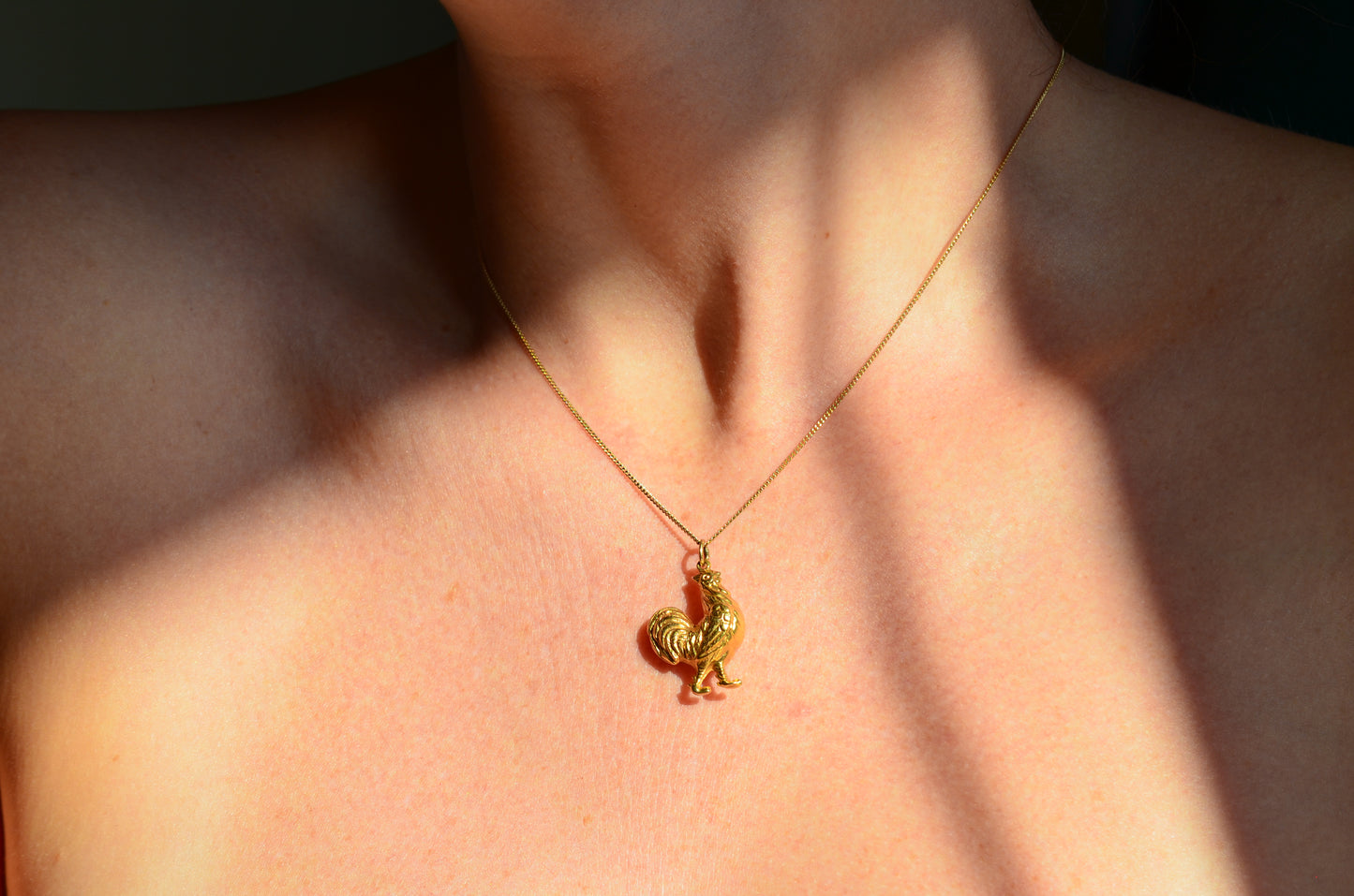 Robust Gold Cock(erel) Charm '69