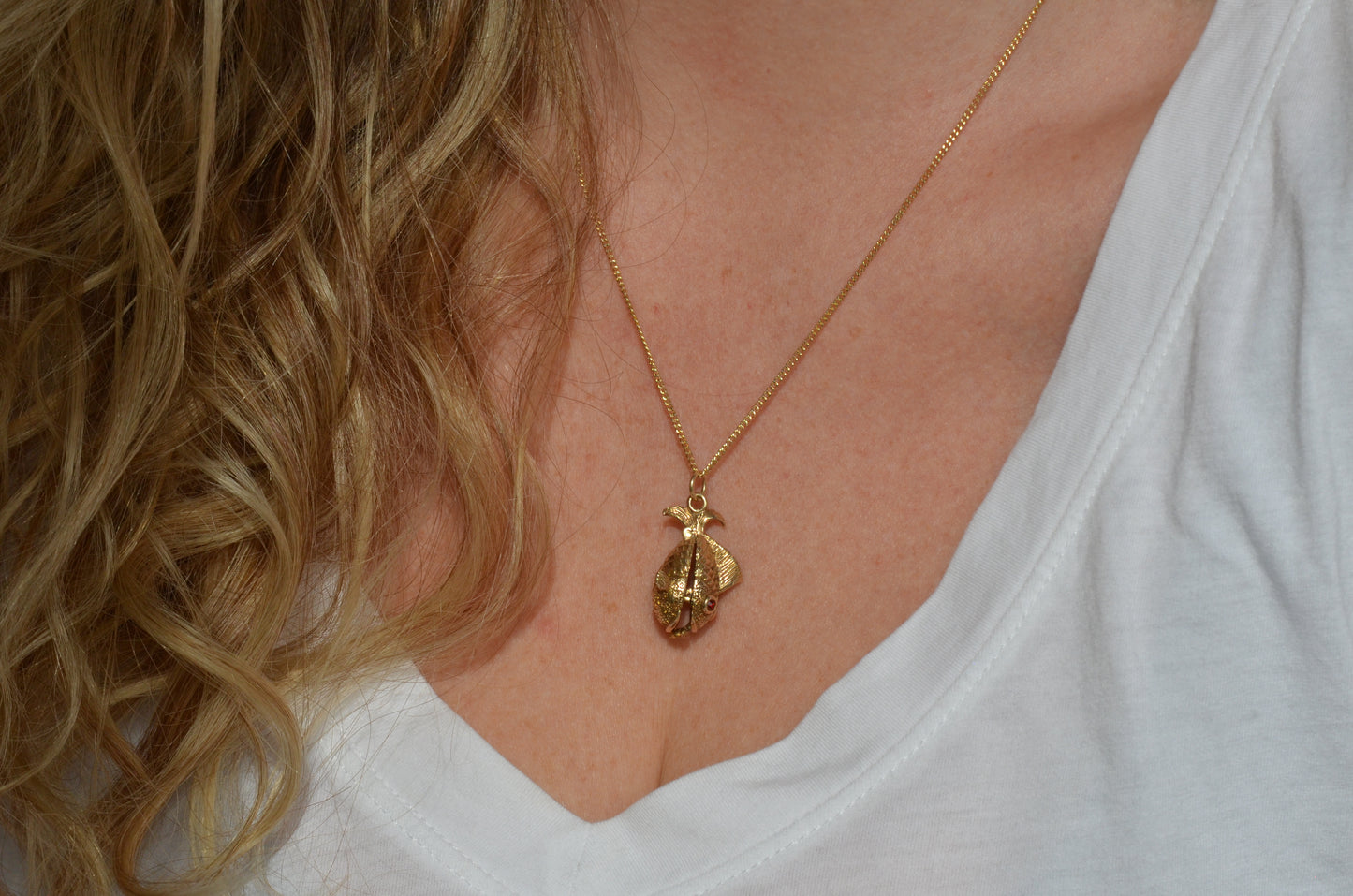 Articulated Fish with Worm Charm