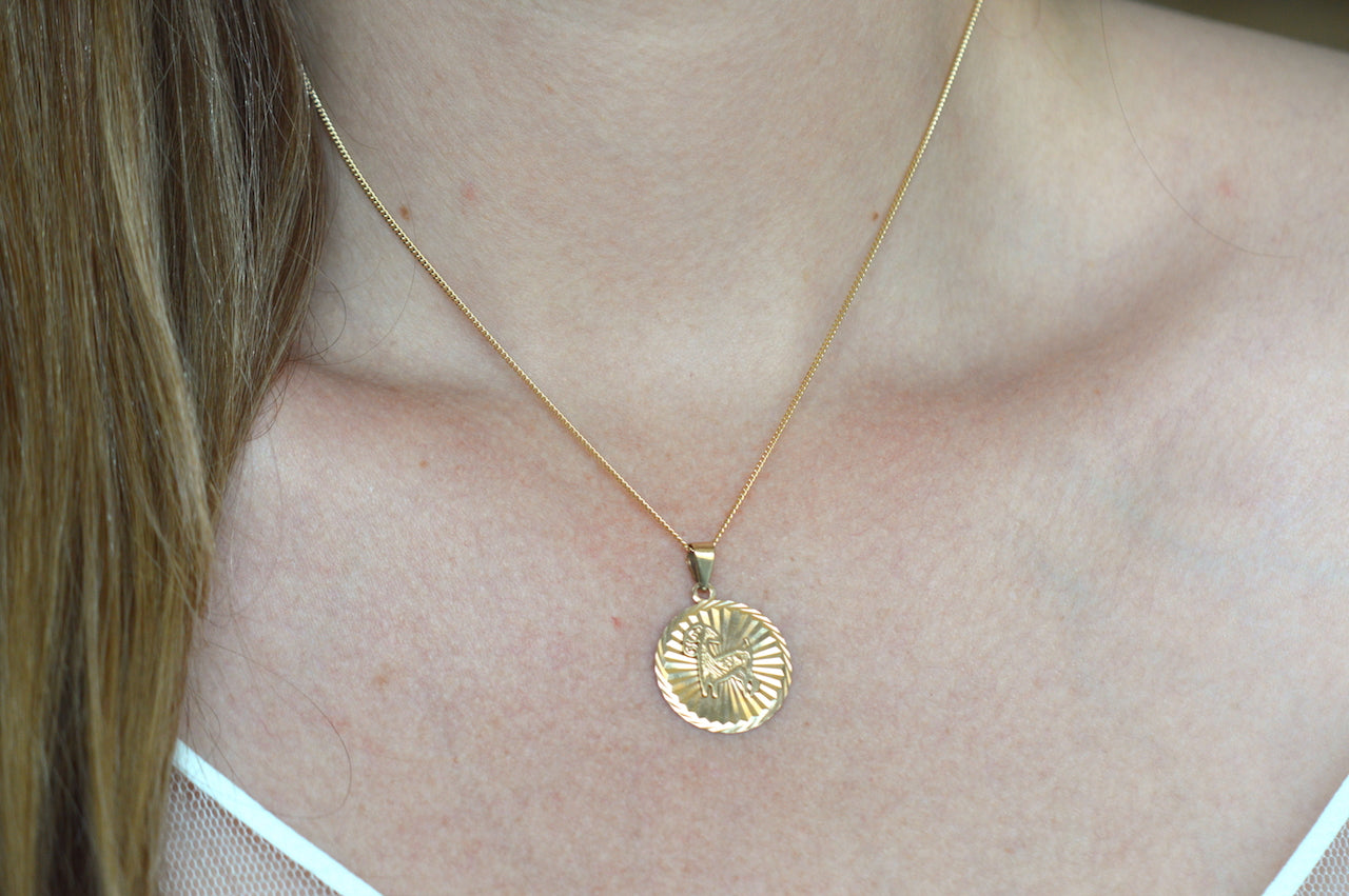 Shimmering Estate Aries Medallion