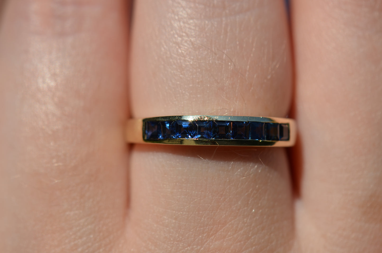 Sleek Vintage Sapphire Channel Band