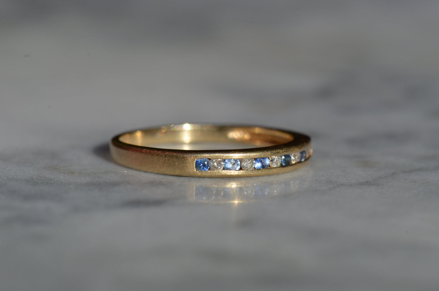 Cornflower Blue Sapphire and Diamond Half Eternity