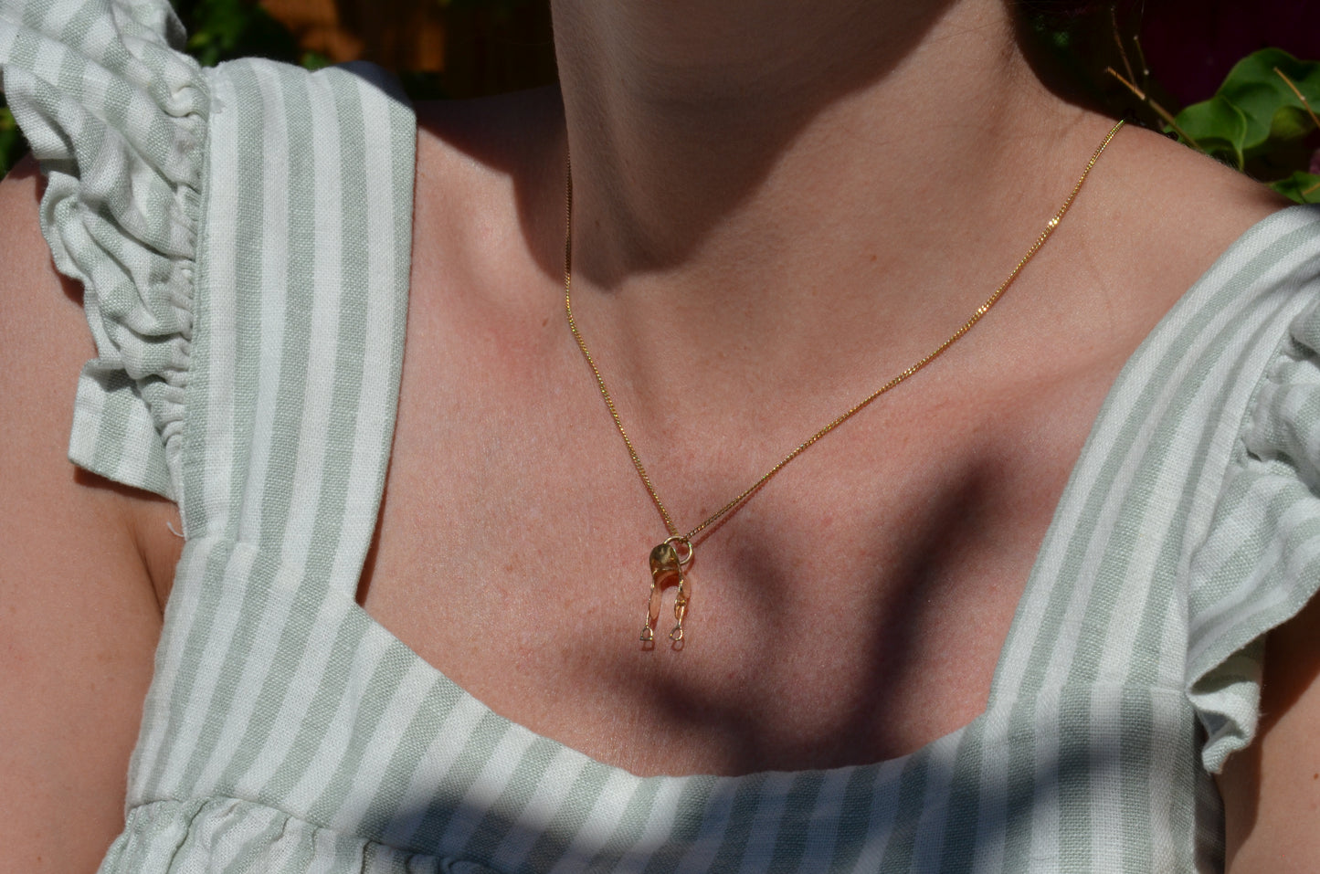 Articulated Midcentury Saddle Charm