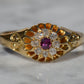 Scintillating Antique Ruby Halo Belcher Ring