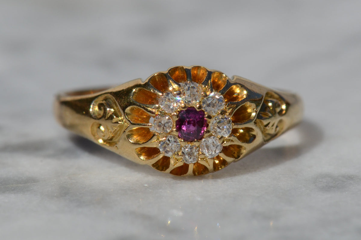 Scintillating Antique Ruby Halo Belcher Ring