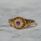Scintillating Antique Ruby Halo Belcher Ring