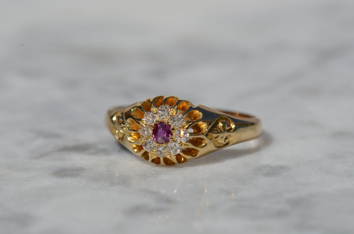 Scintillating Antique Ruby Halo Belcher Ring