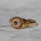 Scintillating Antique Ruby Halo Belcher Ring