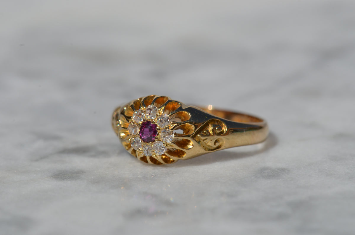 Scintillating Antique Ruby Halo Belcher Ring