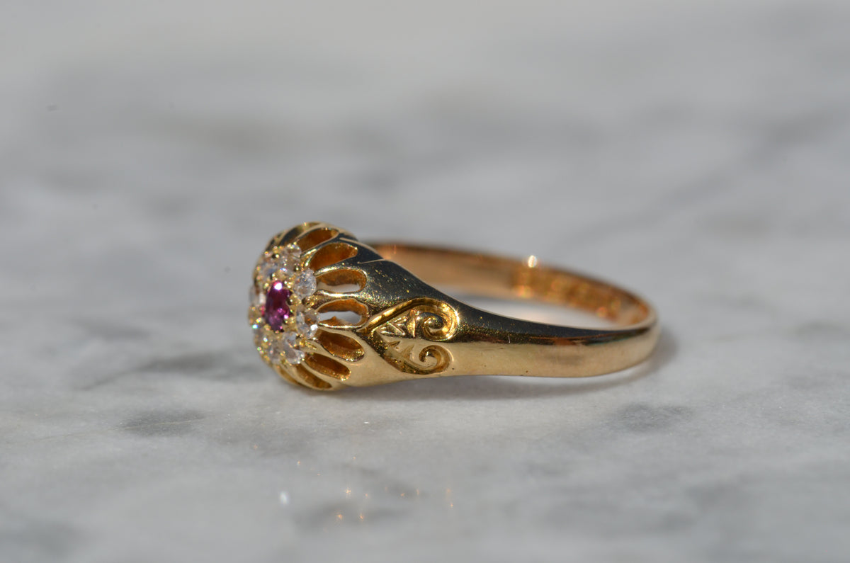 Scintillating Antique Ruby Halo Belcher Ring