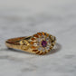 Scintillating Antique Ruby Halo Belcher Ring