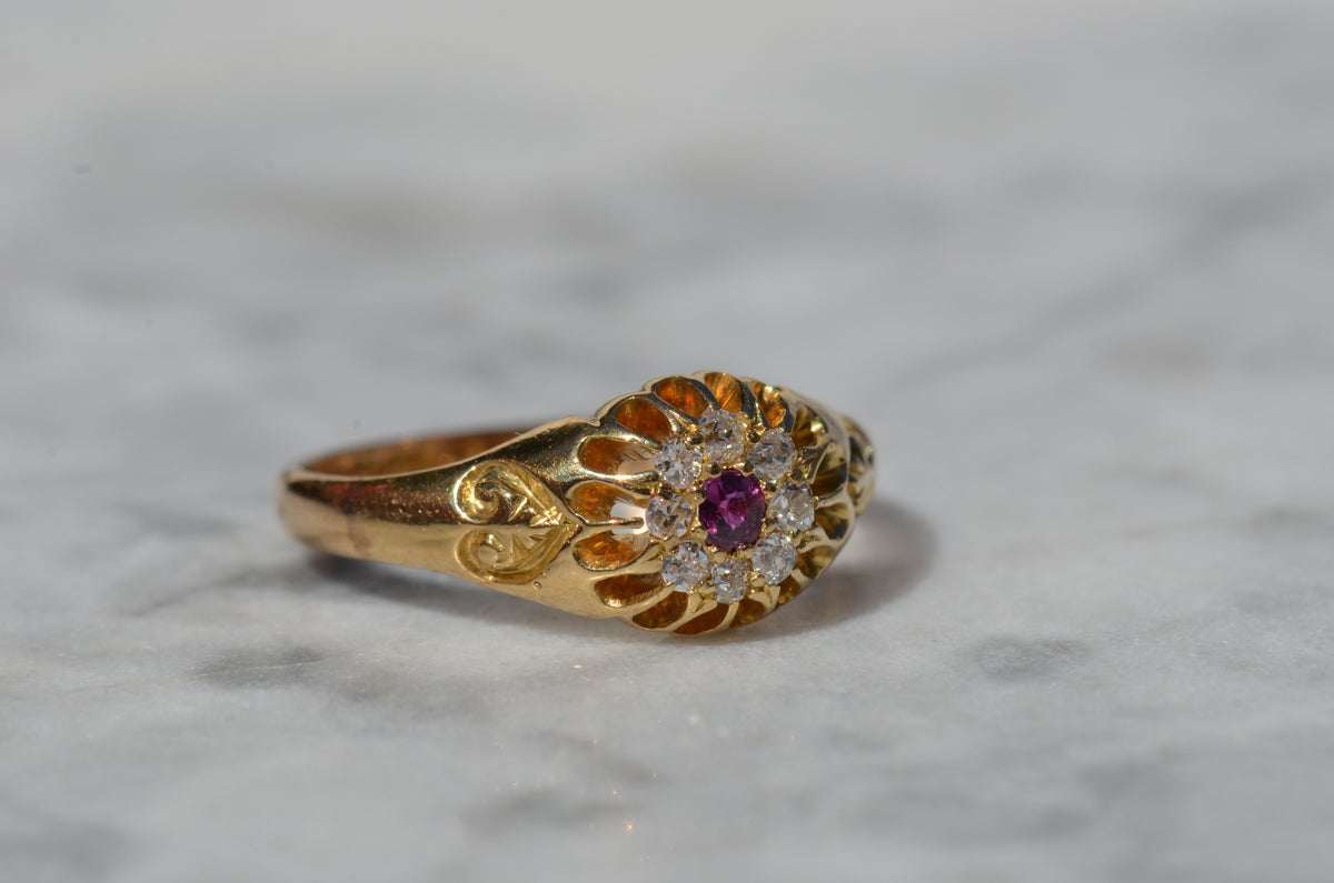Scintillating Antique Ruby Halo Belcher Ring