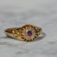 Scintillating Antique Ruby Halo Belcher Ring