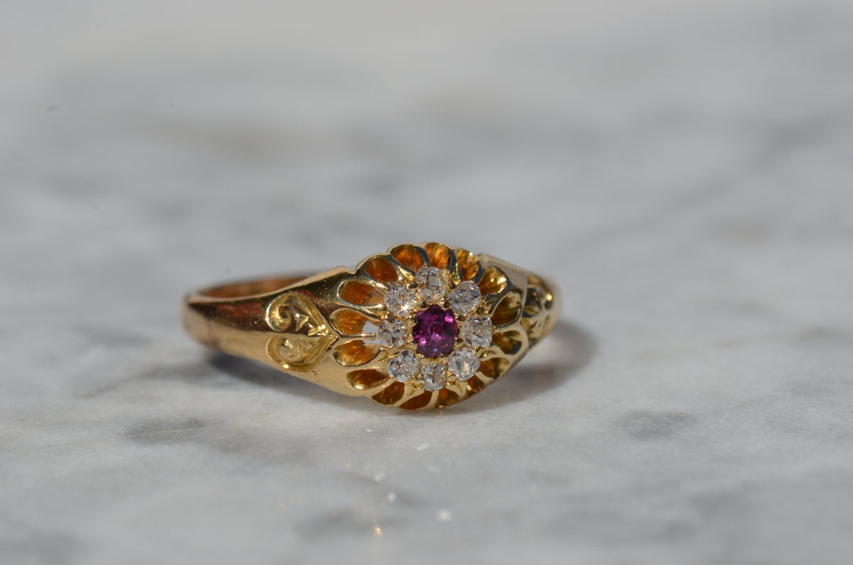 Scintillating Antique Ruby Halo Belcher Ring