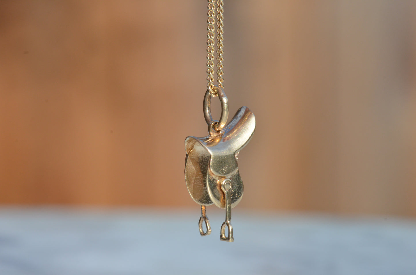 Articulated Midcentury Saddle Charm