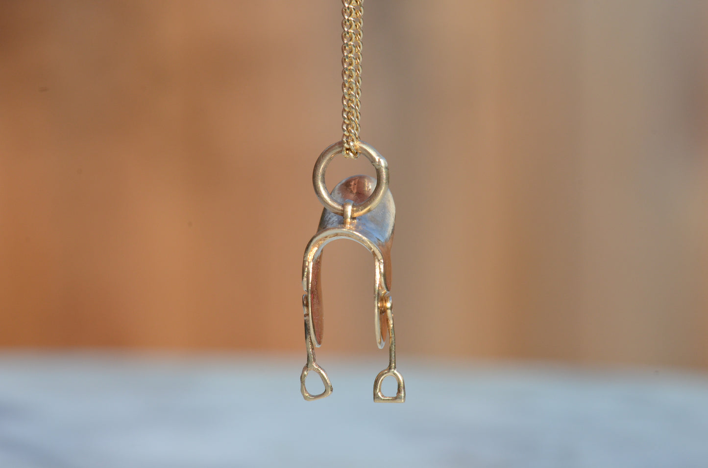 Articulated Midcentury Saddle Charm