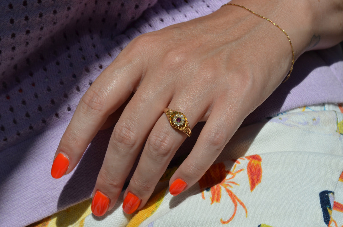 Scintillating Antique Ruby Halo Belcher Ring