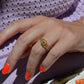 Scintillating Antique Ruby Halo Belcher Ring