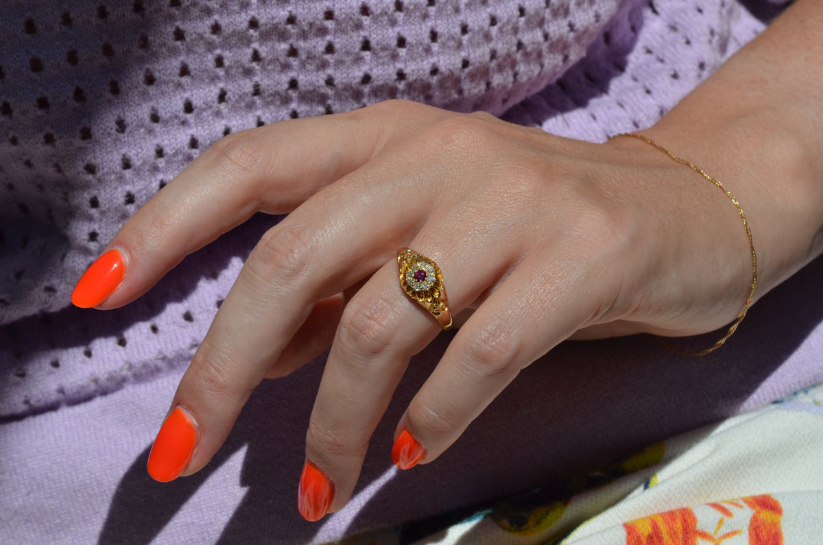 Scintillating Antique Ruby Halo Belcher Ring