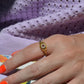 Scintillating Antique Ruby Halo Belcher Ring