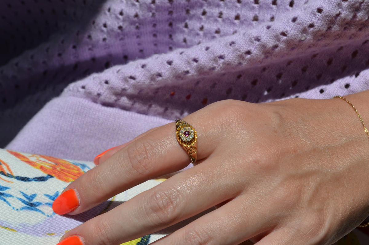 Scintillating Antique Ruby Halo Belcher Ring
