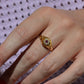 Scintillating Antique Ruby Halo Belcher Ring