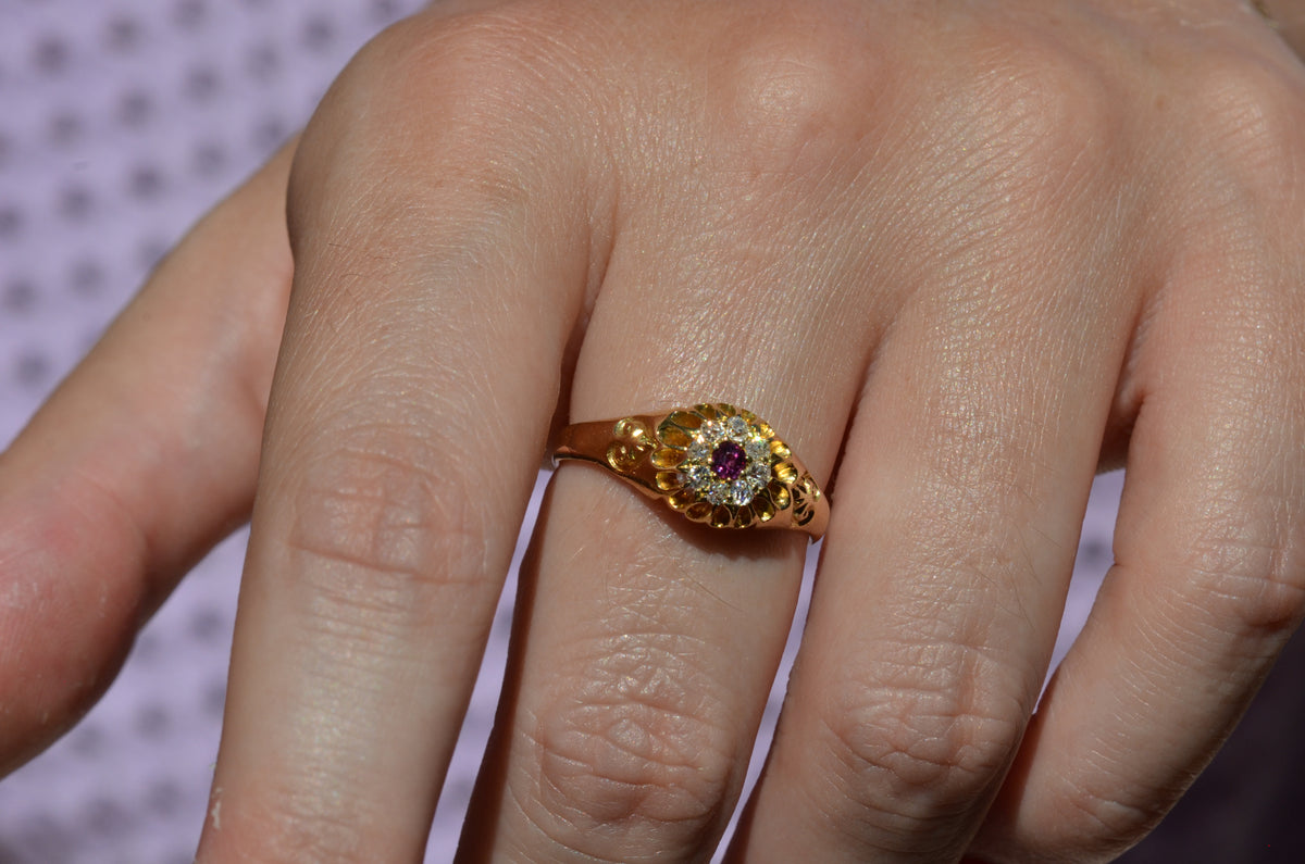 Scintillating Antique Ruby Halo Belcher Ring