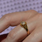 Scintillating Antique Ruby Halo Belcher Ring