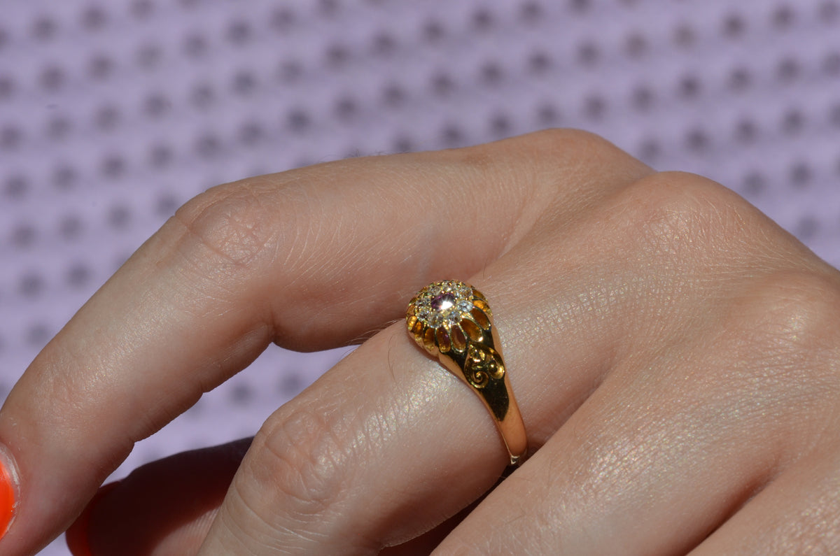Scintillating Antique Ruby Halo Belcher Ring