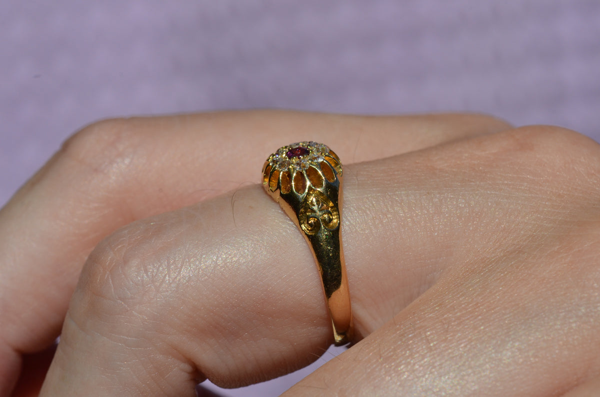 Scintillating Antique Ruby Halo Belcher Ring