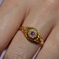 Scintillating Antique Ruby Halo Belcher Ring