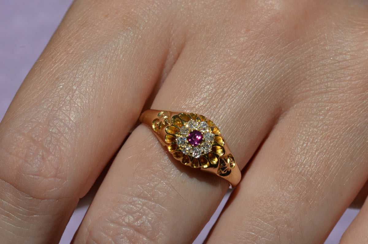 Scintillating Antique Ruby Halo Belcher Ring