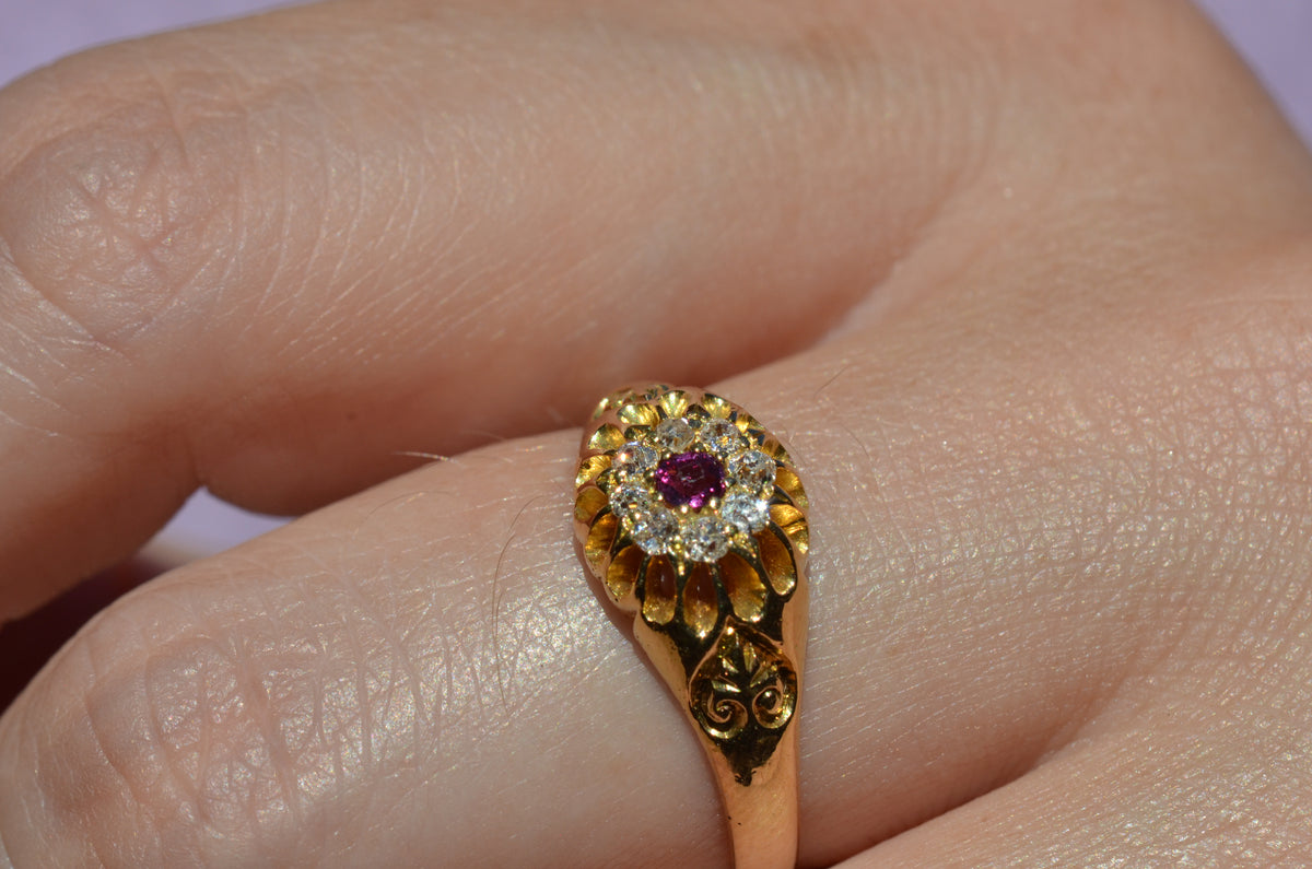 Scintillating Antique Ruby Halo Belcher Ring