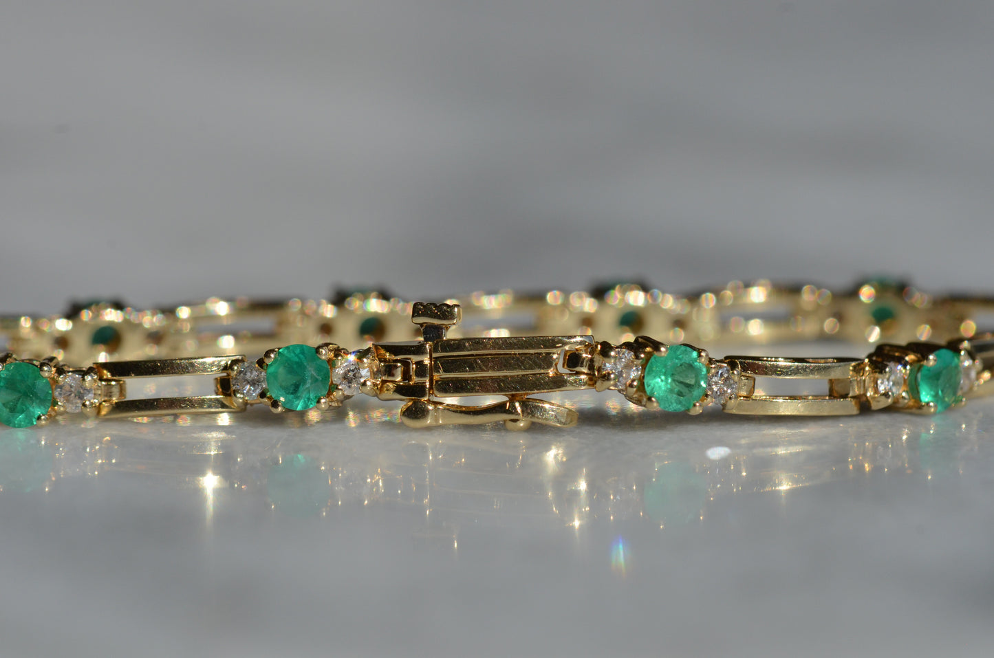 Vibrant Emerald and Diamond Station Bracelet