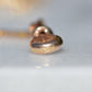 Worn British hallmarks on the outer edge of the dog clip clasp.