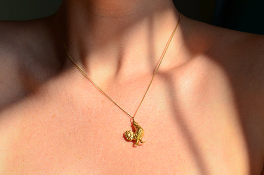 Robust Gold Cock(erel) Charm '69