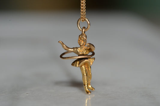 Playful Vintage Hula Hooping Charm