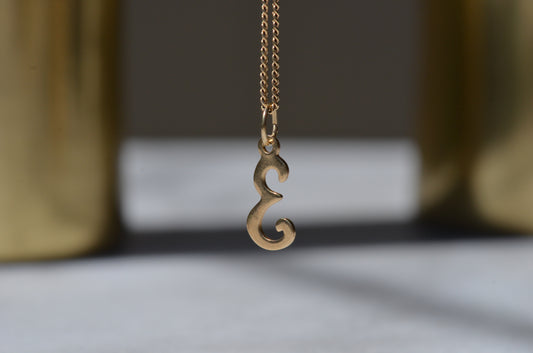 Delicate "E" Charm 1