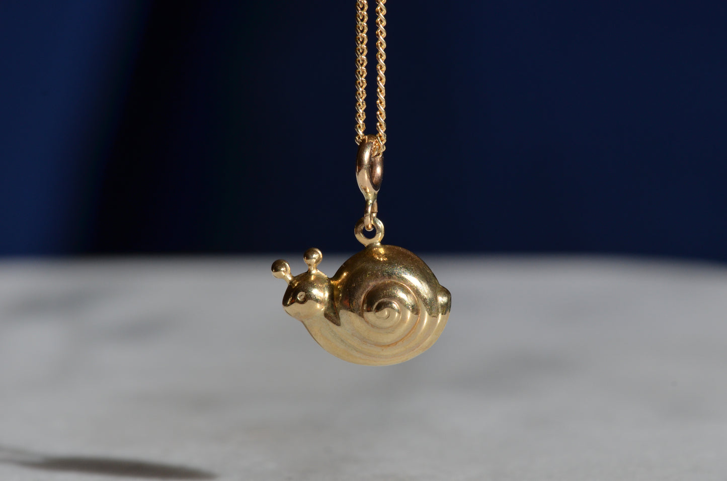 Puffed Estate Snail Charm