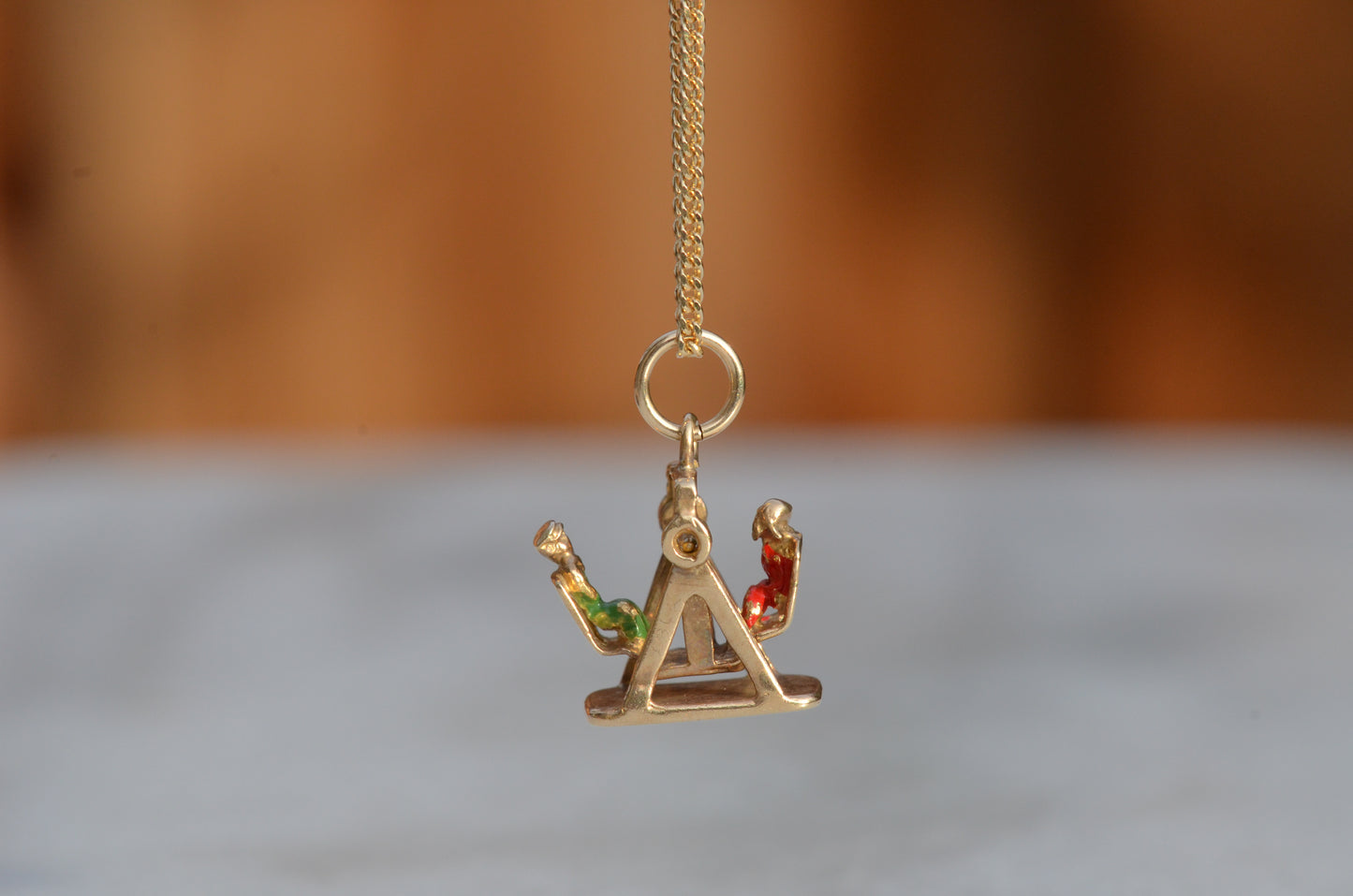 Playful Enameled Swing Charm