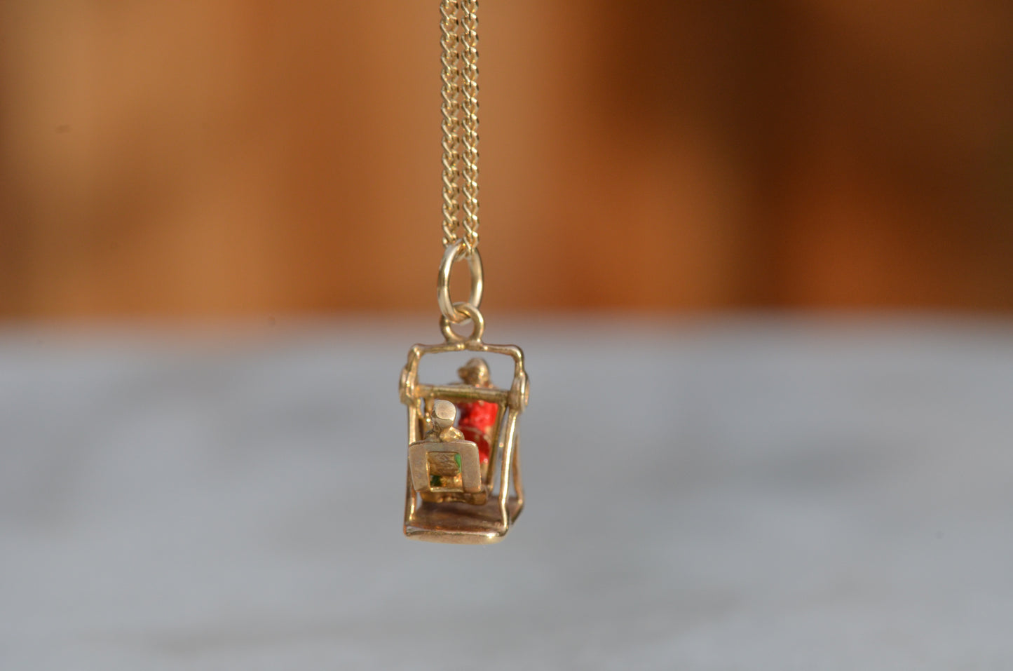 Playful Enameled Swing Charm