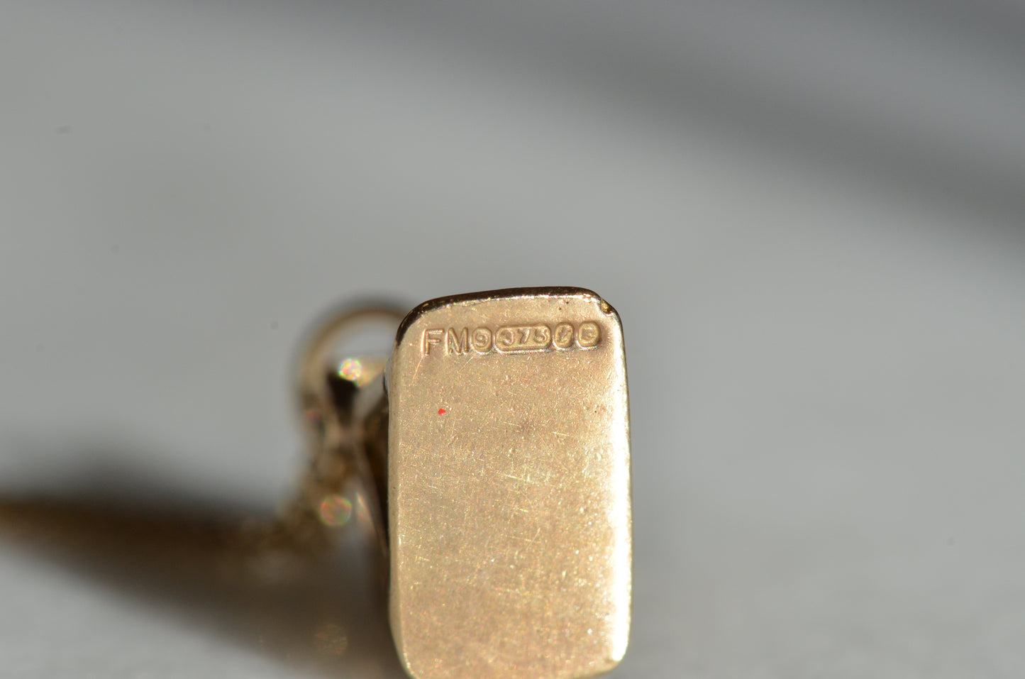 Playful Enameled Swing Charm