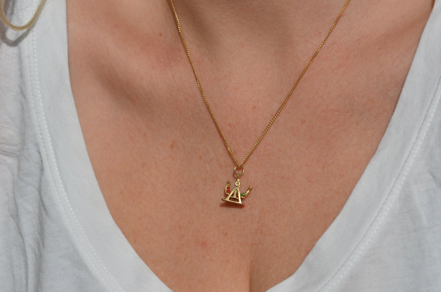 Playful Enameled Swing Charm