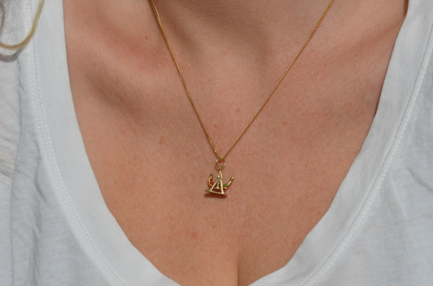 Playful Enameled Swing Charm