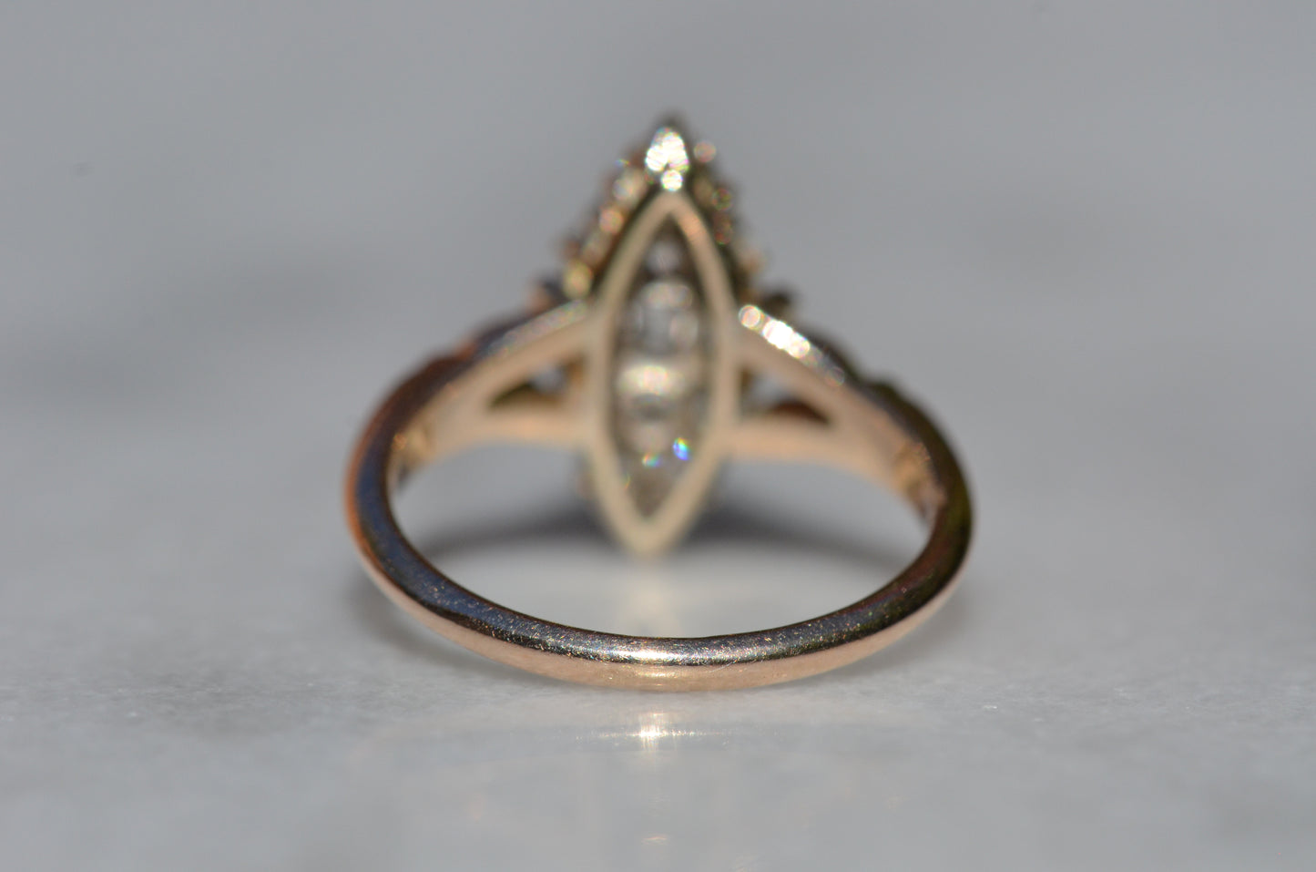 The closely cropped macro of this Victorian diamond navette ring is photographed from behind, focusing on the very good condition of the back of the band.