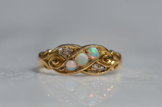 Swirling Antique Opal and Diamond Ring