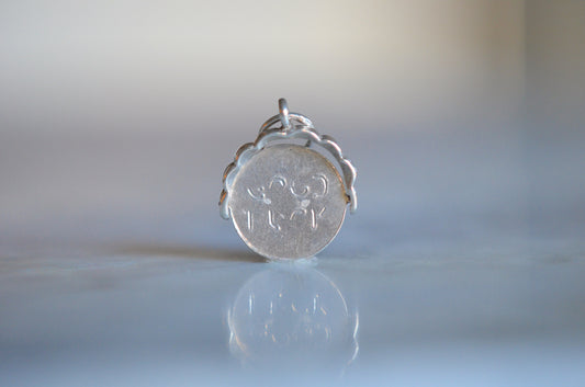 Vintage Silver "Good Luck" Spinner With Scallop