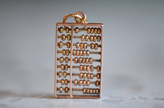 Delicate Moving Abacus Charm