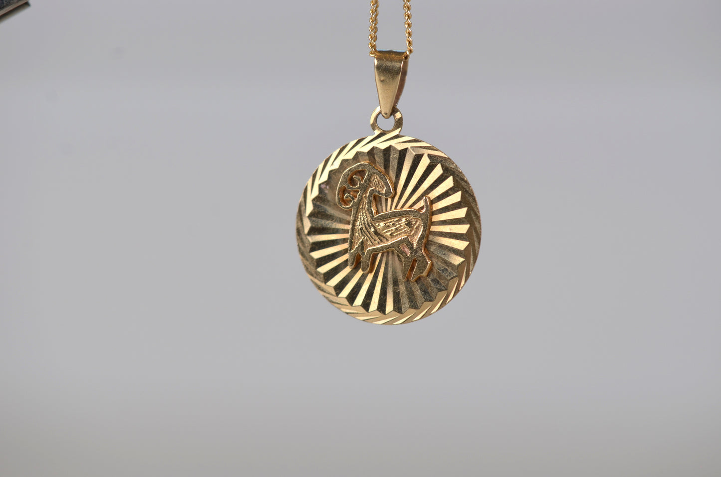 Shimmering Estate Aries Medallion
