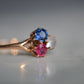 Delicate Moonstone, Ruby, and Sapphire Clover Ring