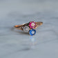 Delicate Moonstone, Ruby, and Sapphire Clover Ring